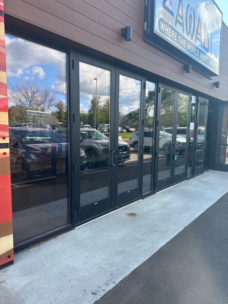 Durable commercial storefront door with aluminum frame for high-traffic entrances