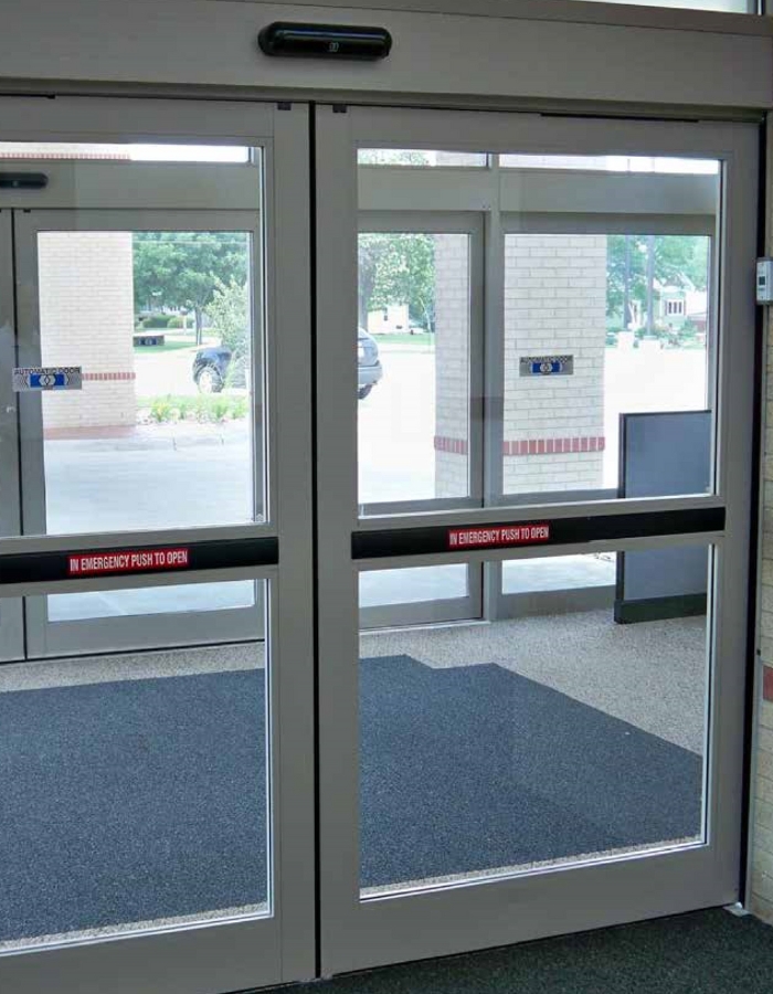 Automatic sliding commercial doors